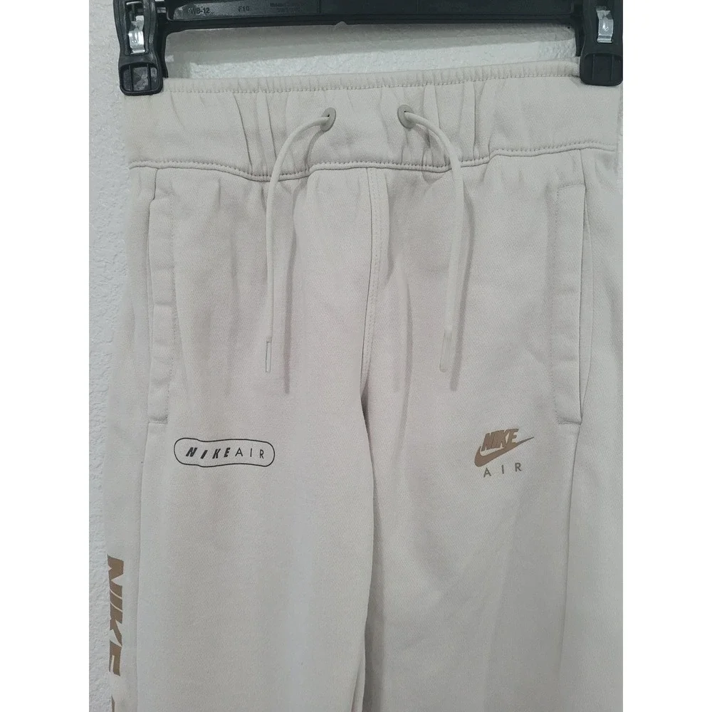 Nike Air Joggers Oatmeal Gold‎ Metallic Logo Mesh Panel Fleece Kids Small #2